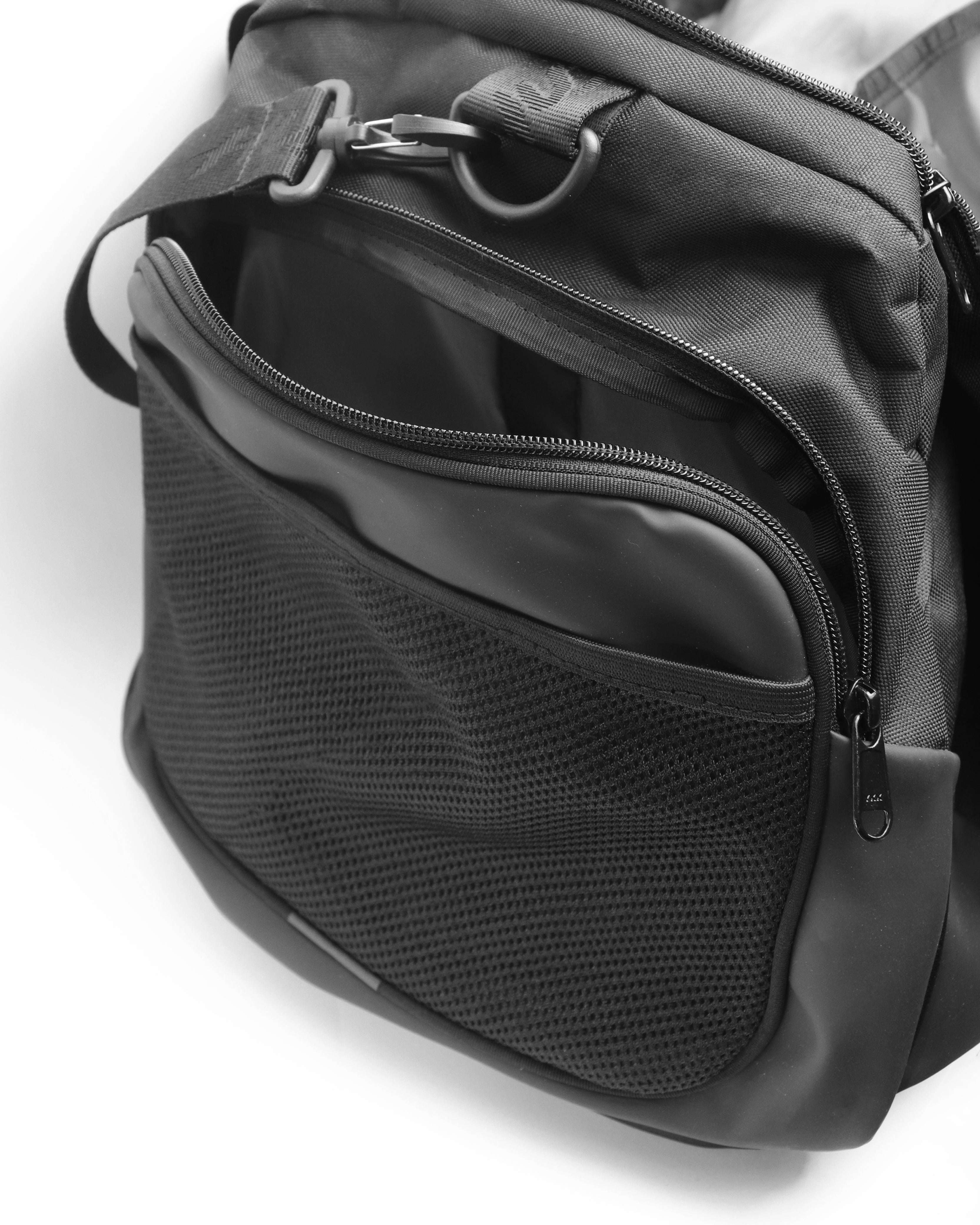 Black gym duffel bag with large vented pocket | Hustlers Only PK